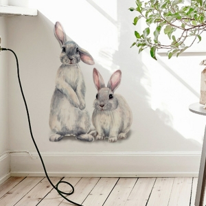 Muurdecoratie van twee schattige konijntjes voor meisjes met een witte achtergrond