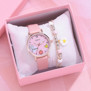een roze horloge en bijpassende armband in een juwelendoosje