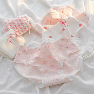 Meisjesonderbroek in wit en roze met strikjes, hartjes, konijntjes en strepen, van geribd katoen